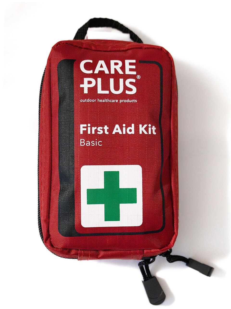 A red zippered pouch labeled First Aid Kit with a green cross, for storm prep in Cedar Rapids, IA